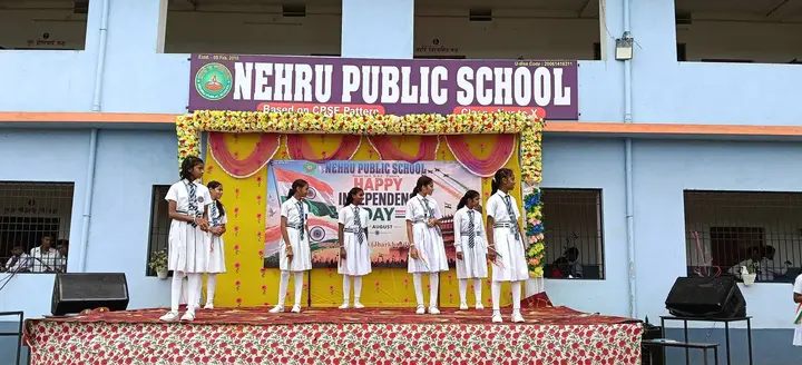 Independence Day stage in front of the school building
